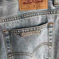 CHROME HEARTS Blue Jeans With Black Leather Crosses